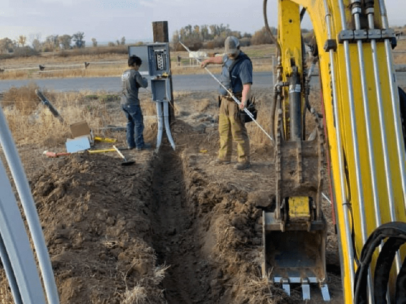 platinum electric workers doing the electical construction for underground wiring in rigby id