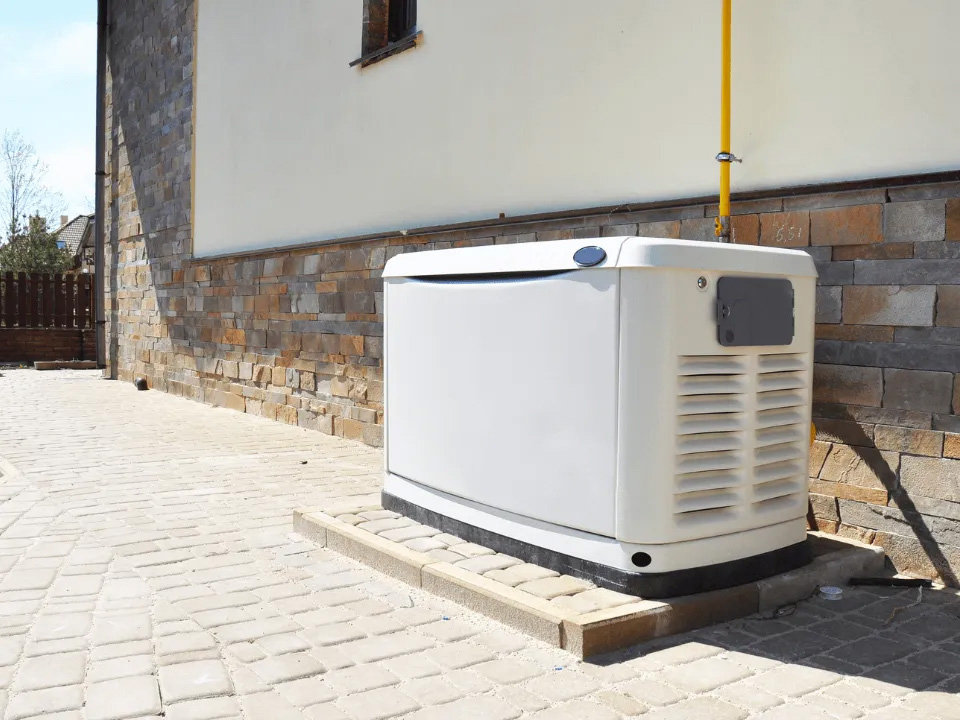 A picture of generator by Platinum Electric powering whole house