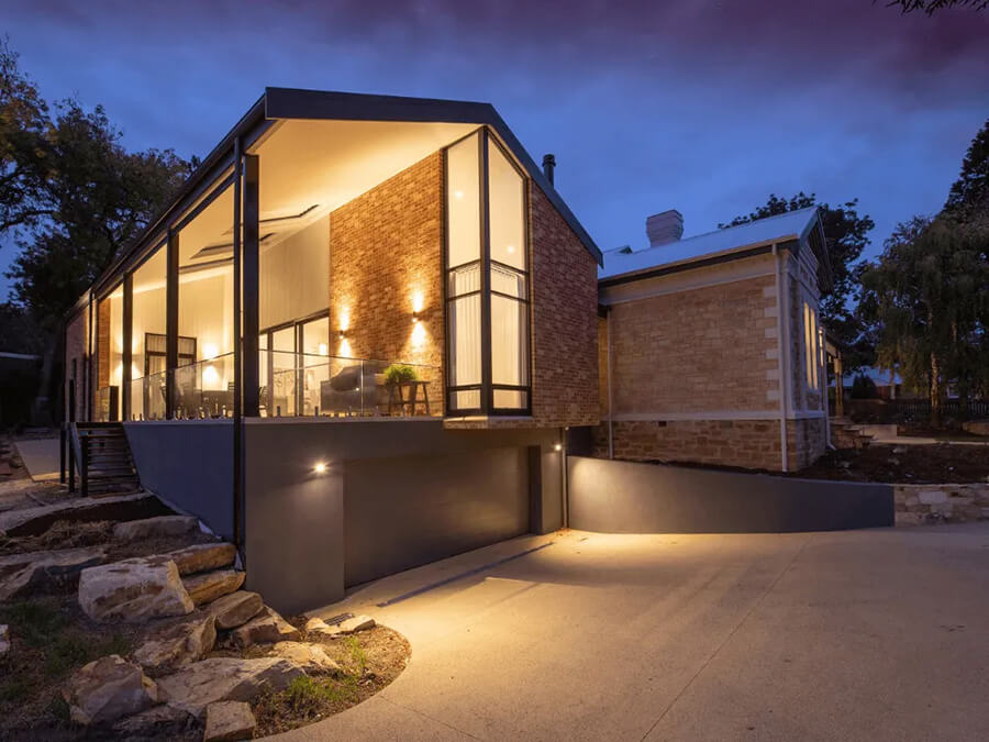 picture of outside of a house showcasing the exterior residential lighting in rexburg id by platinum electric